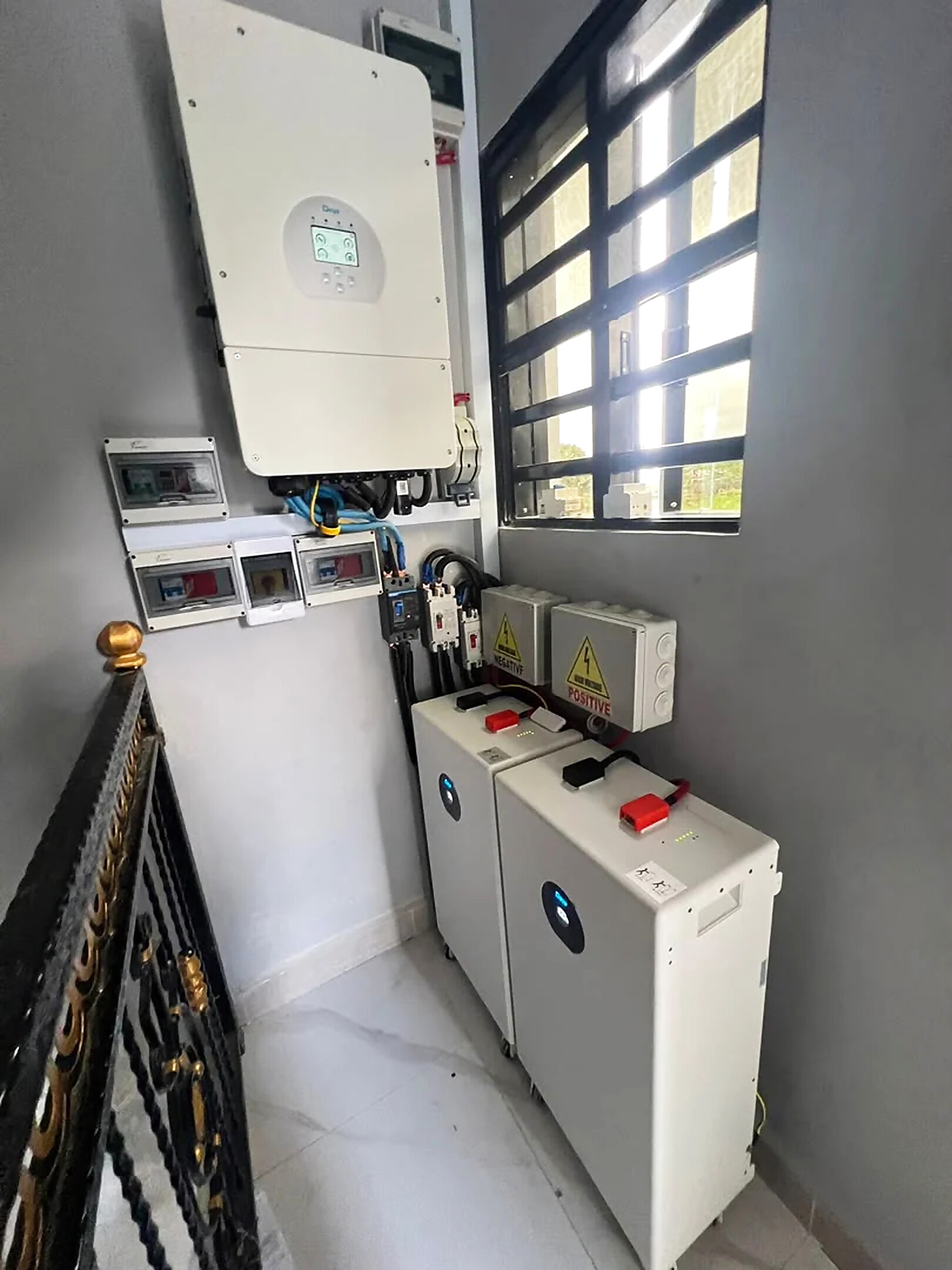Deye hybrid inverter with two floor-standing lithium batteries